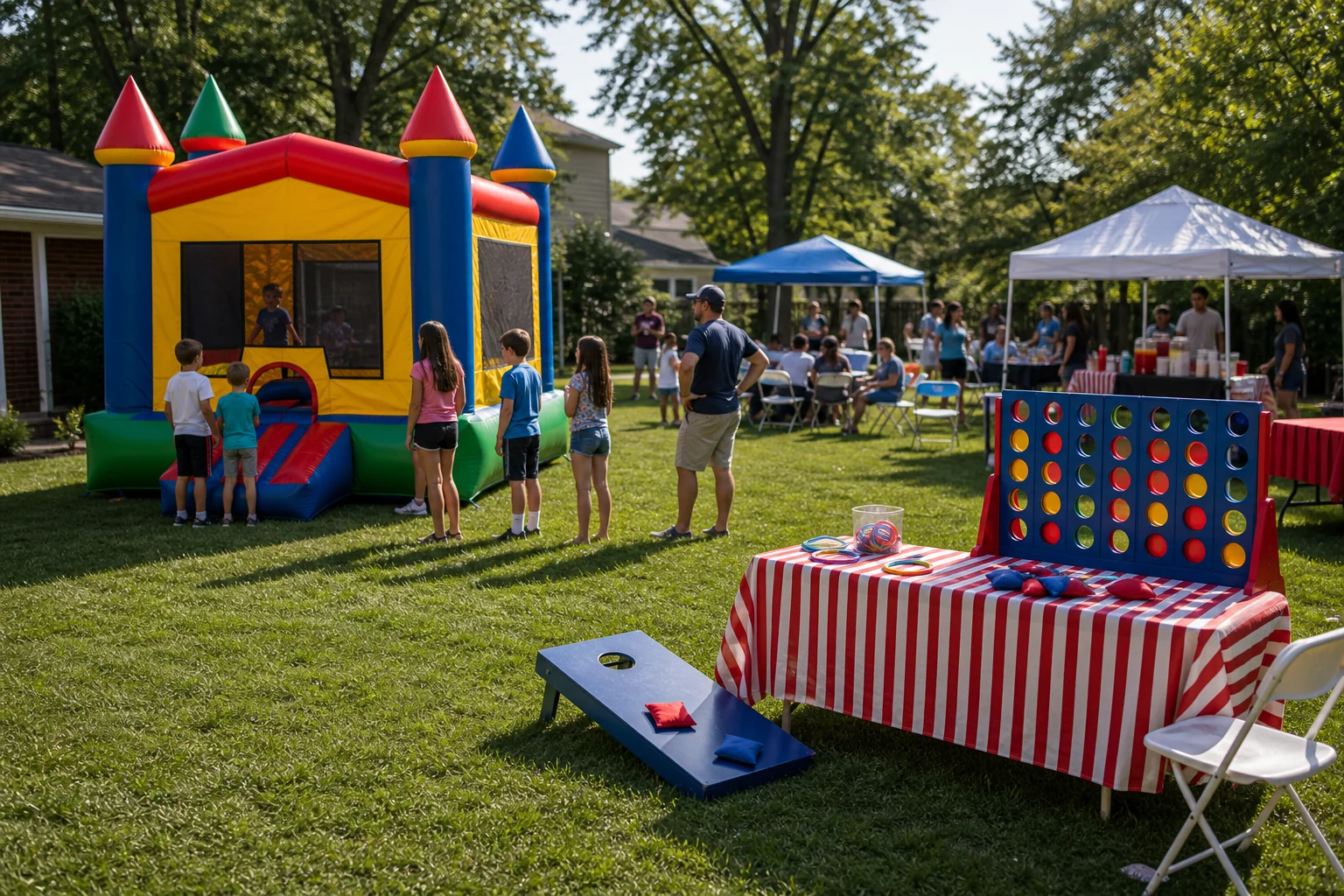 Delaware County bounce house and carnival game feature with picnic seating, queue area, and suburban lawn