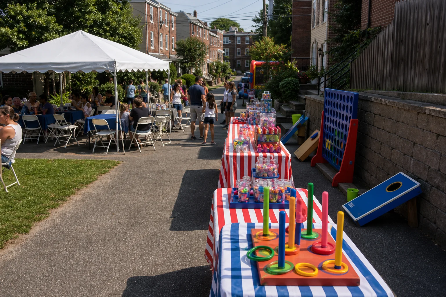 Manayunk and Roxborough carnival game setup with tent seating, compact game tables, blank prize area, and neighborhood backdrop